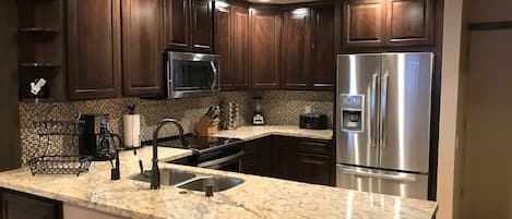 Brand New Kitchen, Knotty Alder Cabinets, SS appliances, granite, etc