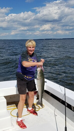 It's a Donna day on the bay. Calm waters, blue sky, and rockfish!