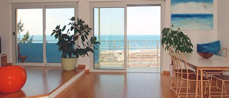 Living room, the big windows facing the sea