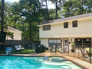 Saltwater pool. Hot tub. Bbq, separate sections for charcoal and gas.