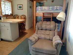 Comfy handmade double bunk bed and breakfast bar will delight you.