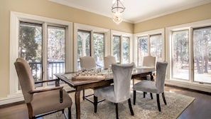 Formal Dining opens to living with fireplace and kitchen.