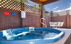 Small clubhouse with hot tub.