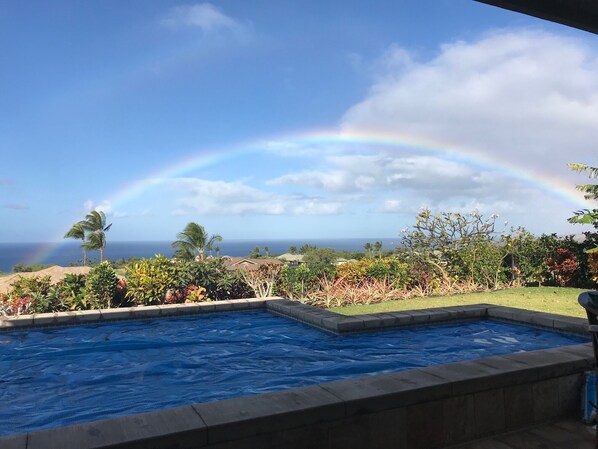Rainbow over the ocean from the lanai