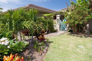 This property is surround by lush tropical fruit trees, plumeria and palm trees