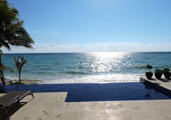 Ocean front in Playacar with infinite pool.  
Current view