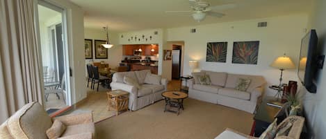 Very large living area with a 55" HDTV.  Beautiful views of the beach!