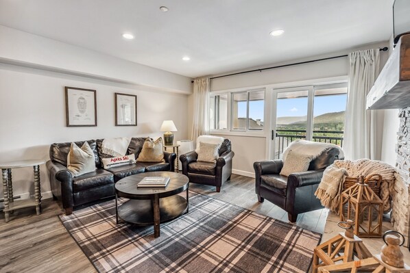 Sliding glass door to large balcony overlooking downtown Breckenridge