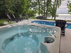 View from the hot tub, across pool to the lake.