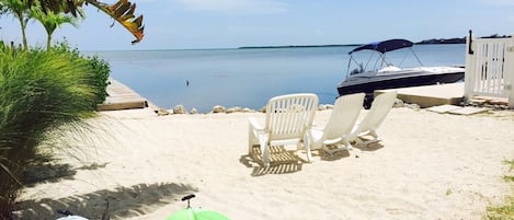 Relax on the little sandy beach. 