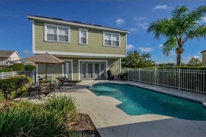 Oversized pool. Child safety gate provided. South facing pool.