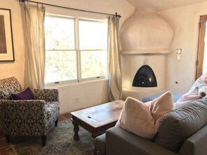 Relax by the fire, with fluffy pillows and warmth.