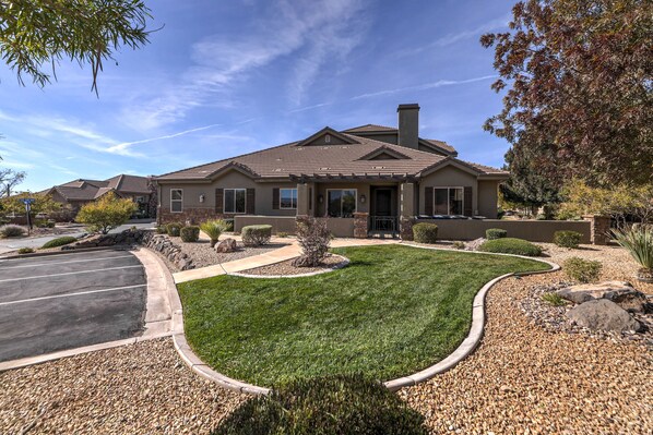 Front of home next to the clubhouse and entrance with close parking.