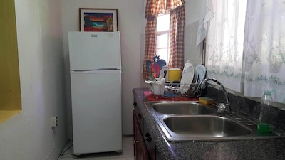 Two Bedroom Apartment in Rose Hall with Hot Water, Wifi and Cable