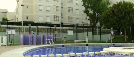 Outdoor swimming pool, paddle court, garden