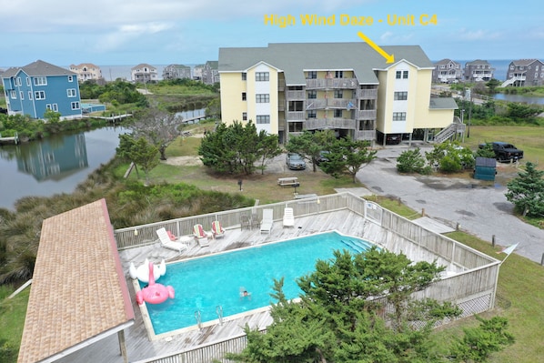 Large pool with seating in sun or shade.