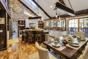 Full kitchen with dining room table