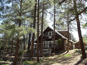 In the Tall Shady Pines. Plenty of parking in front and back.