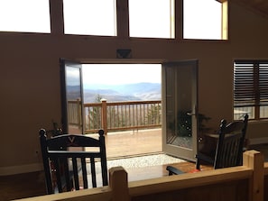 The French doors in the summer looking out to the valley below.