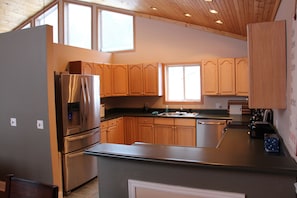 Spacious kitchen with new stainless appliances and double oven