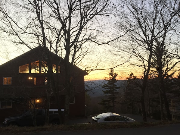 View of the house at sunset from West Ridge Road.