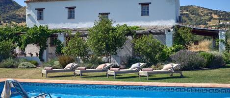 The finca sits in a green valley 10 mins from beautiful Ronda and it's all yours