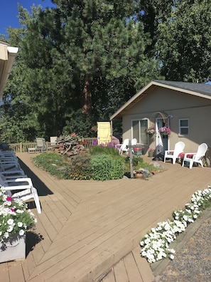 Community deck for entertaining and dining options, offers beautiful views