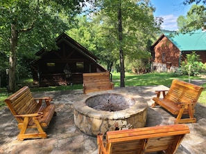 Fire pit in front of the cabin.