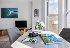 There are a selection of books, guides and games in the apartment