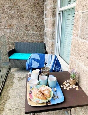 Enjoy breakfast on the balcony