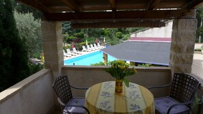 Out door terrace overlooking pool and gardens