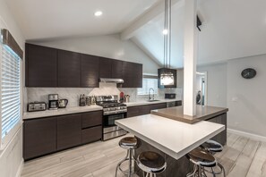 Upstairs kitchen & breakfast bar