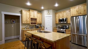 Updated stainless steel appliances, including a double oven for group cooking
