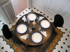 The entryway set up for dining for 4!.
