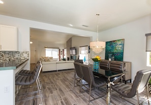 Tile floors throughout the living space makes for pool friendly fun..