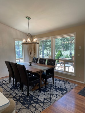 Open floor plan with dining room attached to kitchen and living room