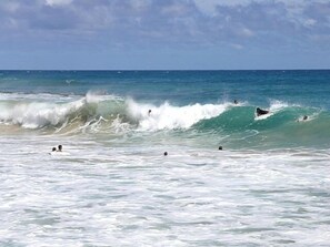 Surfing and boggie boarding are 200 feet from the house