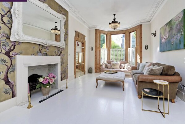 Former painted floor boards now natural oak wood floor
