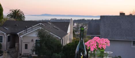 Sunset on the front deck with a view of Downtown Santa Barbara and the ocean