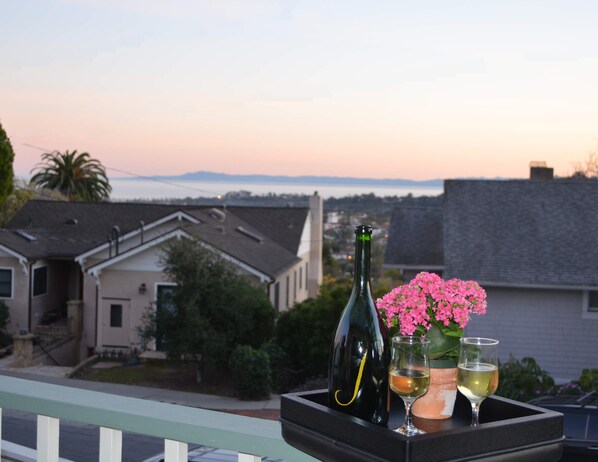 Sunset on the front deck with a view of Downtown Santa Barbara and the ocean