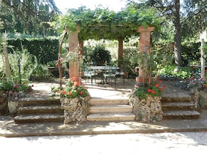 Garden Pergola in front of the Casale