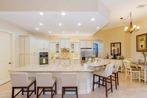 Breathtaking kitchen with huge sit down island