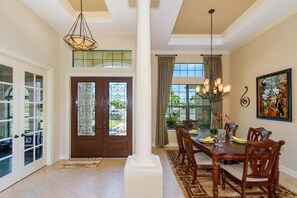 The formal dining room is located next to the front entrance