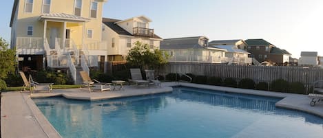 Rear view of house and beautiful pool with shallow area for the little ones.