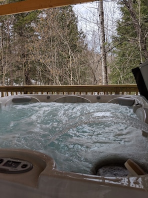 Enjoy the 7 person hot tub after a long day of hike and ski