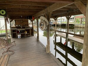 Covered boathouse. A great place to spend time on a rainy day.