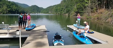 2 paddle boards, 2 kayaks and 3 person canoe. assorted life vests provided.