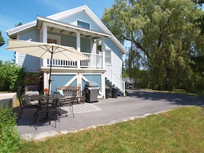 Gas grill and patio seating to enjoy in a private setting.