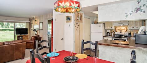 Dining area with view of kitchen and living room