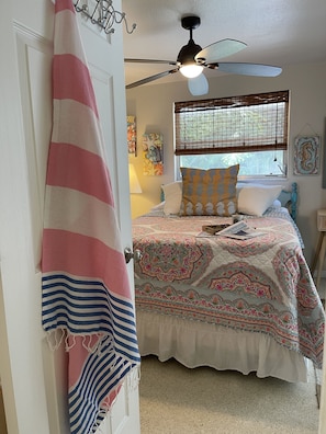 Seahorse room has private door to shared bath and slider to the porch. 